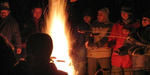 welcoming the New Year by a bonfire